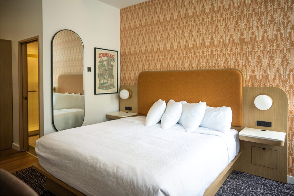Single-bed guest room at The Aiden hotel