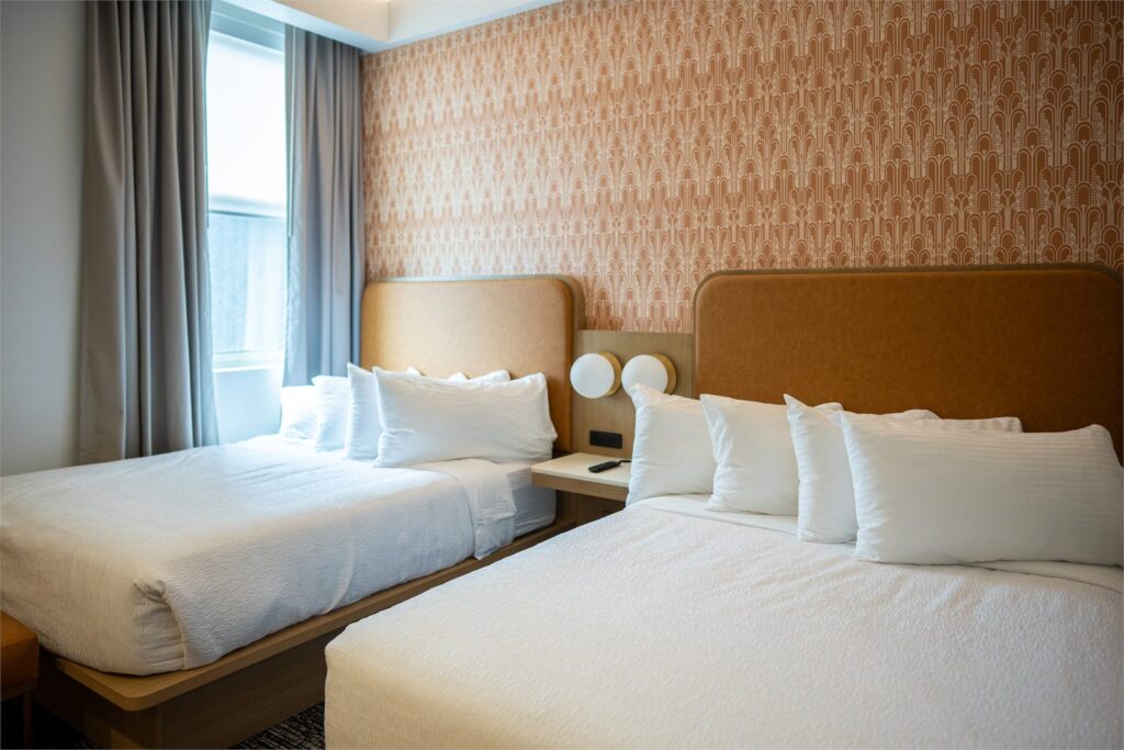 Two-bed guest room at The Aiden hotel